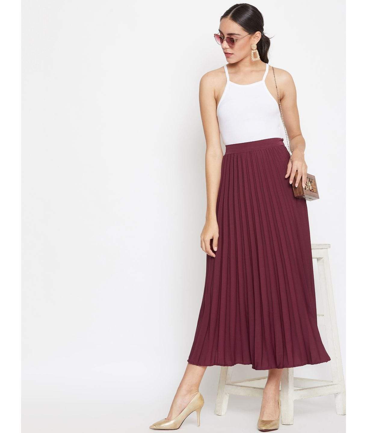 a formal knee-length pleated skirt.-10 Stylish Designs of Formal Skirts to Wear for Office-By live love laugh